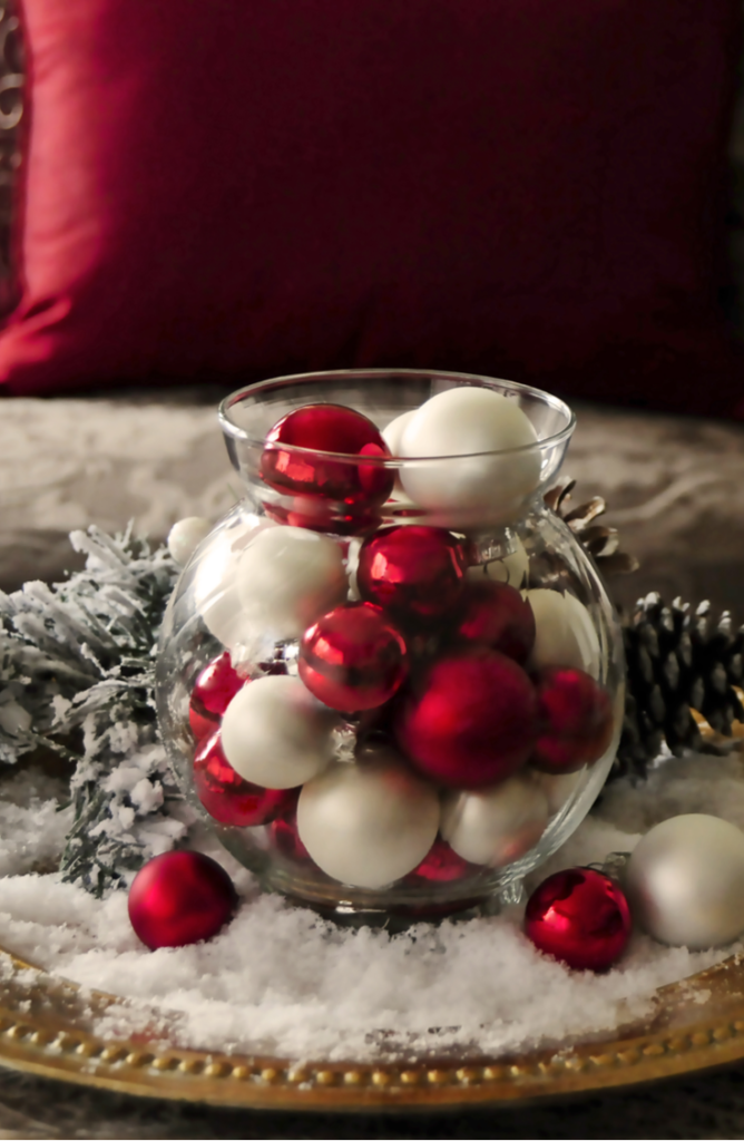 Isn't this DIY Christmas centerpiece just so cute? From centerpieces to decorations, we've got the skinny on some festive dollar store holiday decorating ideas. 