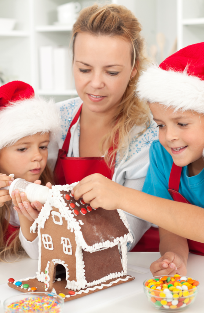 Gingerbread house games are perfect for kids at Christmas parties! If you're looking for fresh Christmas party ideas for decorations, food, and games then you're in the right spot!