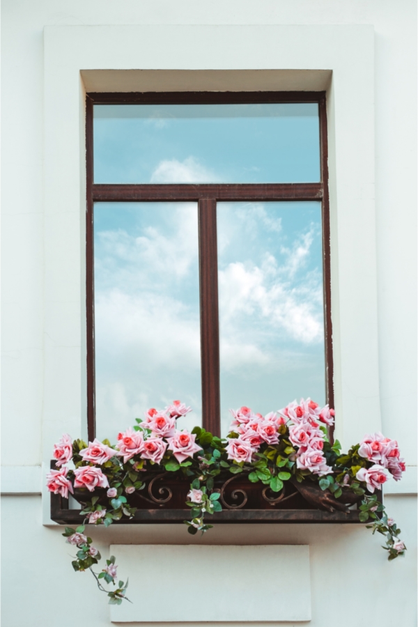 Love farmhouse style craze? Give your home a boost of extra farmhouse curb appeal with surprisingly easy farmhouse window flower boxes DIY projects. You will love the difference they make on your home. 