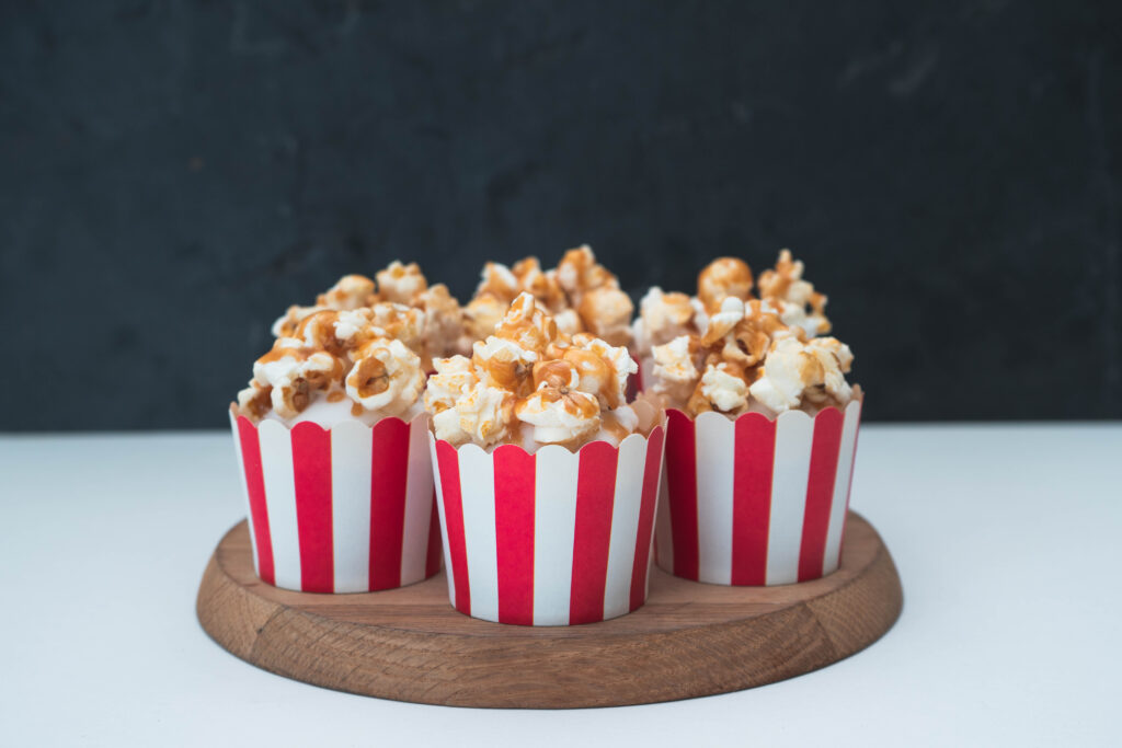 The circus never goes out of style, which is why the theme is perfect for birthday parties. Here are a few circus theme birthday party ideas to make the day a memorable one. Popcorn cupcakes fit the theme perfectly. 