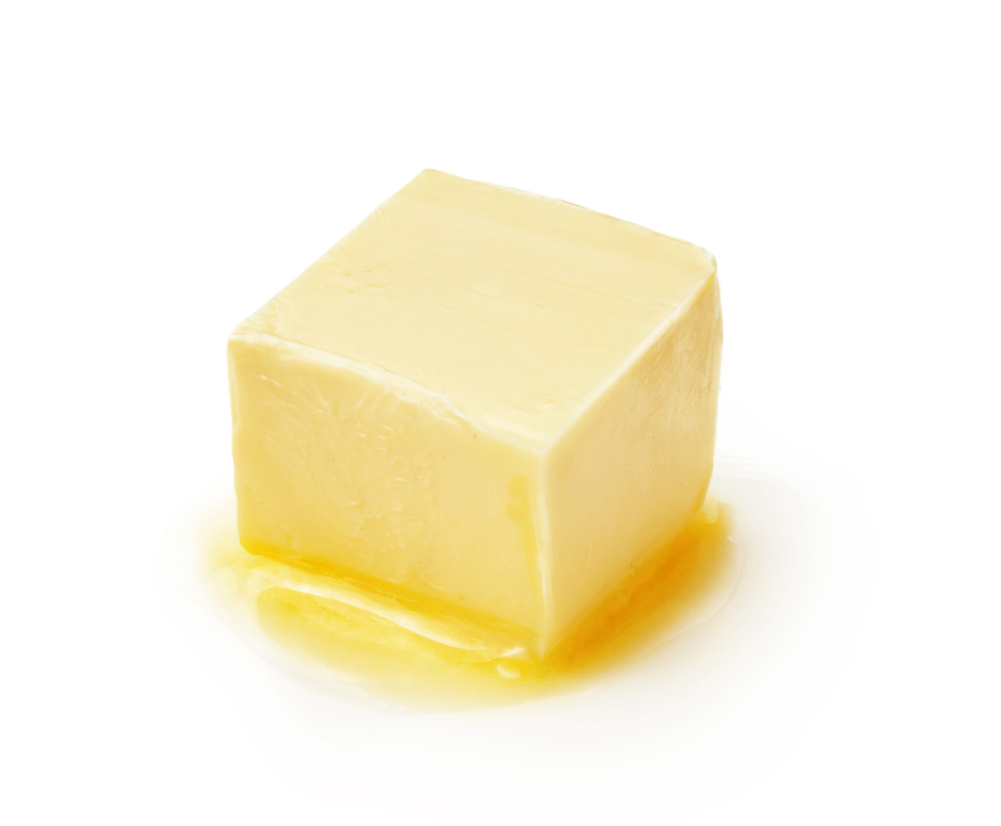 Масло быстро тает. Кубик сливочного масла. Кусочек сливочного масла. Масло на белом фоне. Сливочное масло тает.